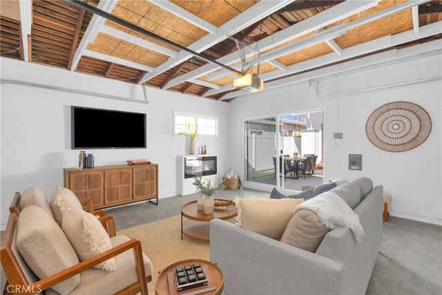 313 14th St, Seal Beach, CA 90740 - living room with concrete flooring and beamed ceiling