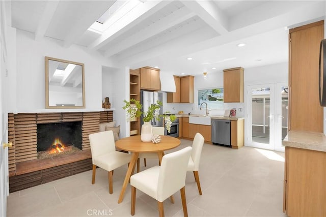 313 14th St, Seal Beach, CA 90740 - dining area with beamed ceiling, a brick fireplace, recessed lighting, and light tile patterned floors
