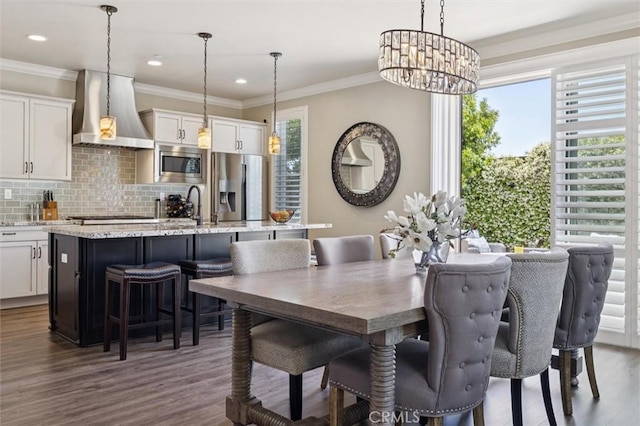 3032 Cortuna Dr, San Luis Obispo, CA 93401 - dining area featuring a chandelier, dark wood-style flooring, crown molding, and recessed lighting