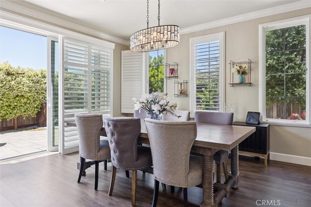 3032 Cortuna Dr, San Luis Obispo, CA 93401 - dining space featuring a chandelier, healthy amount of natural light, crown molding, and wood finished floors
