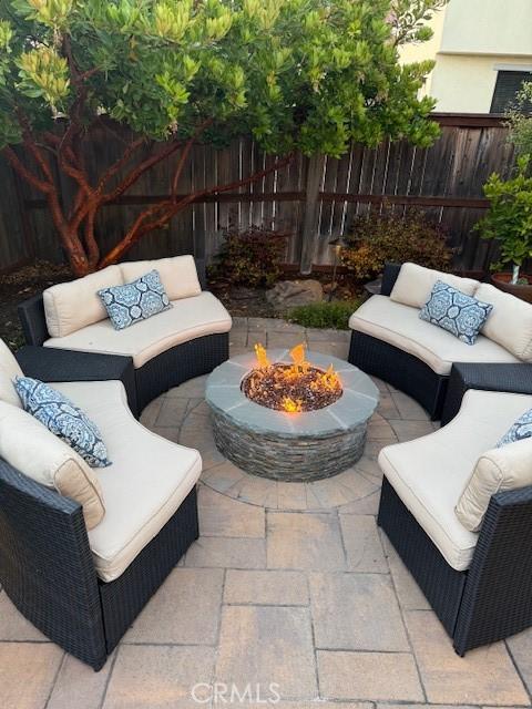 3032 Cortuna Dr, San Luis Obispo, CA 93401 - view of patio with an outdoor living space with a fire pit