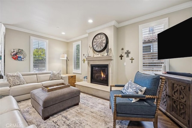 3032 Cortuna Dr, San Luis Obispo, CA 93401 - living area with a glass covered fireplace, ornamental molding, wood finished floors, and recessed lighting