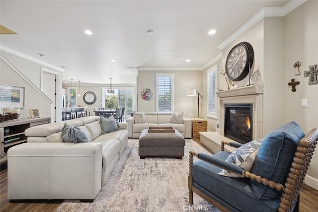 3032 Cortuna Dr, San Luis Obispo, CA 93401 - living area featuring ornamental molding, wood finished floors, a glass covered fireplace, and recessed lighting