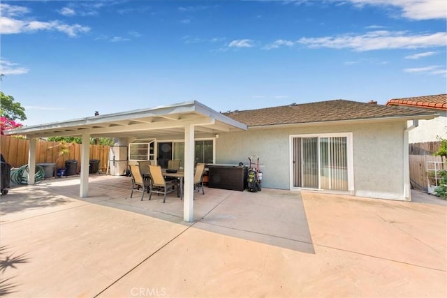 5709 Holly Ridge Dr, Camarillo, CA 93012 - back of property featuring stucco siding, a patio, and outdoor dining area