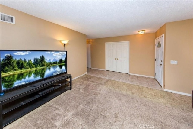 5709 Holly Ridge Dr, Camarillo, CA 93012 - unfurnished living room featuring carpet flooring and tile patterned floors