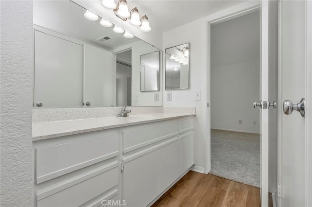 10655 Lemon Ave Unit 2809, Rancho Cucamonga, CA 91737 - bathroom with vanity and wood finished floors