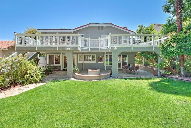 24 Edgebrook Dr, Phillips Ranch, CA 91766 - back of property featuring a patio area, a wooden deck, a yard, and stucco siding