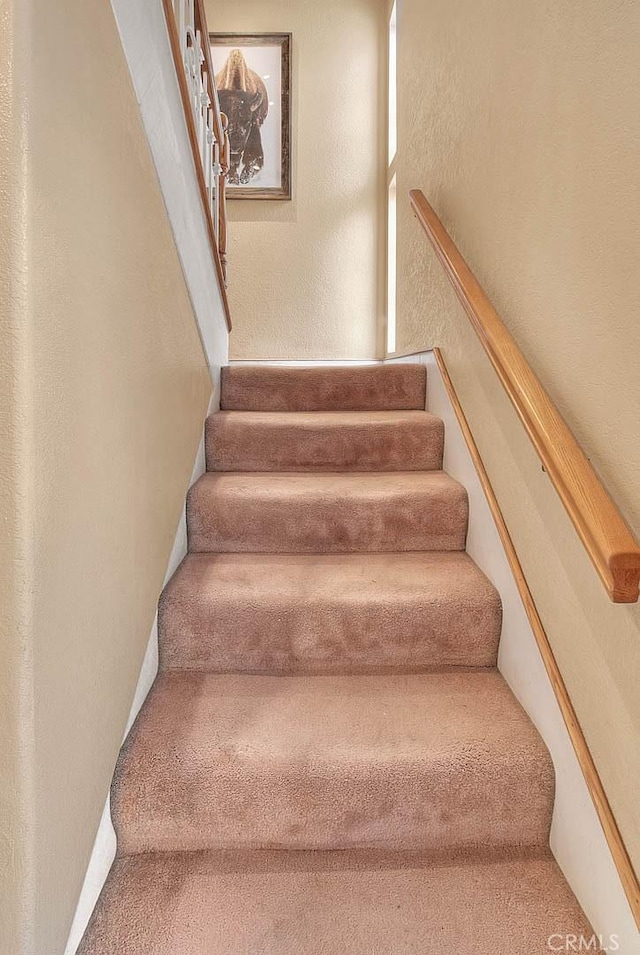 24 Edgebrook Dr, Phillips Ranch, CA 91766 - stairway featuring a textured wall and carpet floors