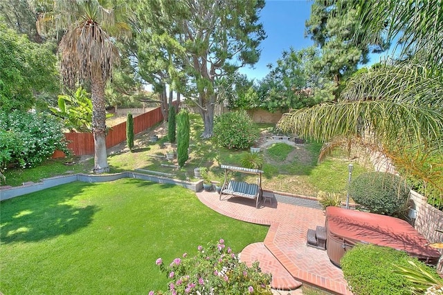 24 Edgebrook Dr, Phillips Ranch, CA 91766 - fenced backyard featuring a hot tub and a patio area