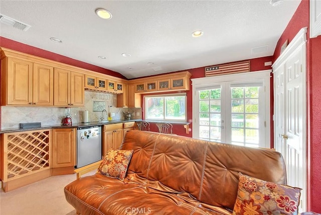 24 Edgebrook Dr, Phillips Ranch, CA 91766 - kitchen with stainless steel dishwasher, backsplash, dark countertops, light carpet, and recessed lighting