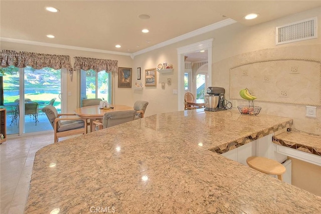 24 Edgebrook Dr, Phillips Ranch, CA 91766 - kitchen with recessed lighting, light stone countertops, crown molding, and light tile patterned flooring