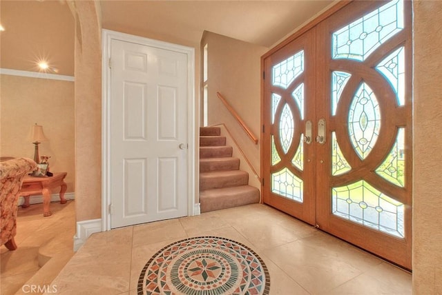 24 Edgebrook Dr, Phillips Ranch, CA 91766 - foyer entrance with tile patterned flooring, stairway, and crown molding