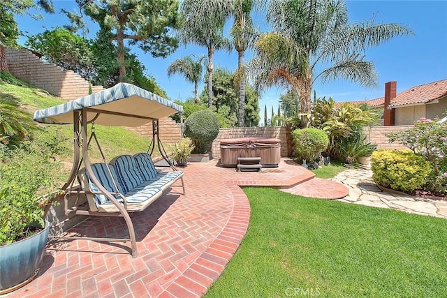 24 Edgebrook Dr, Phillips Ranch, CA 91766 - fenced backyard with a hot tub and a patio area