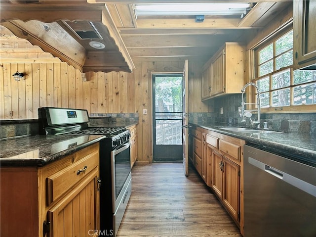 349 Golf Course Rd, Lake Arrowhead, CA 92352 - kitchen with stainless steel appliances, plenty of natural light, wood finished floors, backsplash, and wood walls