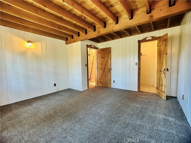349 Golf Course Rd, Lake Arrowhead, CA 92352 - empty room with carpet flooring, wooden walls, and a wood ceiling with exposed beams