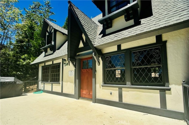 349 Golf Course Rd, Lake Arrowhead, CA 92352 - property entrance featuring stucco siding
