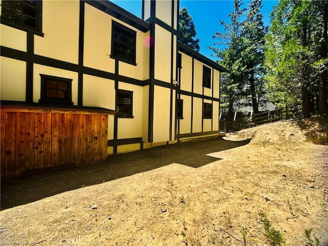 349 Golf Course Rd, Lake Arrowhead, CA 92352 - view of side of property with stucco siding