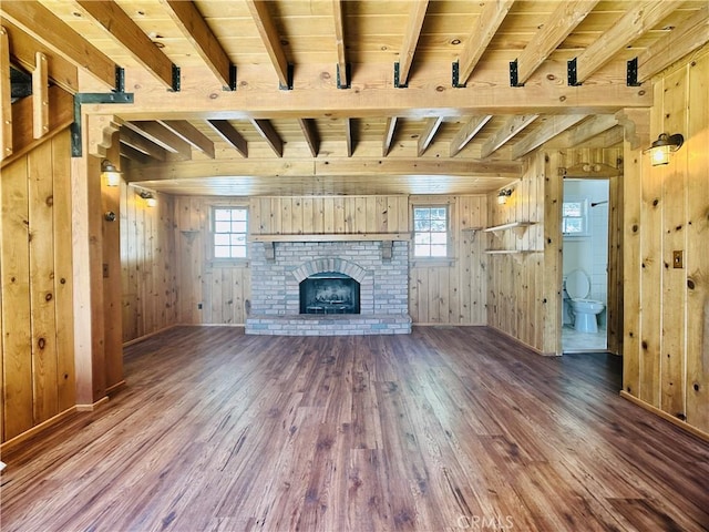 349 Golf Course Rd, Lake Arrowhead, CA 92352 - unfurnished living room with hardwood / wood-style floors, wooden walls, a wood ceiling with exposed beams, and a fireplace