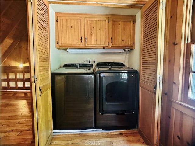 349 Golf Course Rd, Lake Arrowhead, CA 92352 - washroom featuring independent washer and dryer, light wood-type flooring, and cabinet space