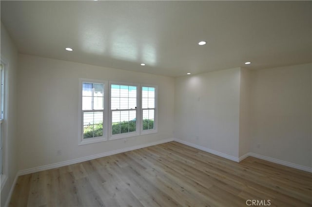 9422 Bartolo Ave, Pico Rivera, CA 90660 - spare room with recessed lighting and light wood-style floors