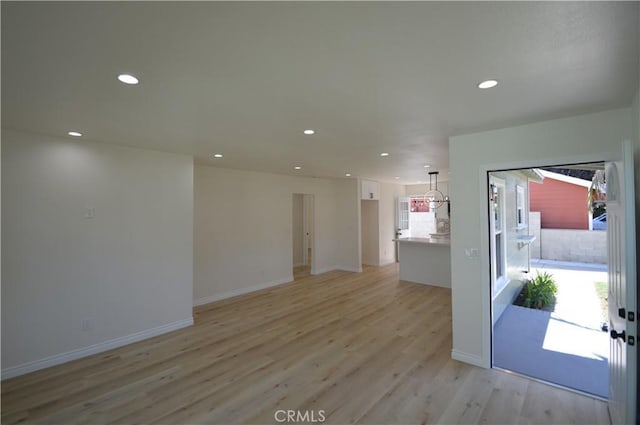 9422 Bartolo Ave, Pico Rivera, CA 90660 - unfurnished room with light wood-style floors and recessed lighting