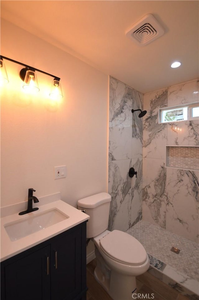9422 Bartolo Ave, Pico Rivera, CA 90660 - bathroom with vanity, a marble finish shower, and recessed lighting