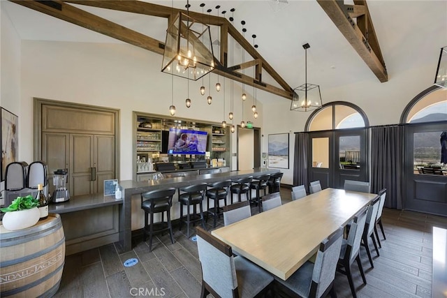 24185 Sprout Dr, Corona, CA 92883 - dining room with high vaulted ceiling, beam ceiling, a chandelier, and dark wood-type flooring