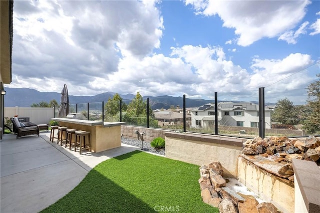24185 Sprout Dr, Corona, CA 92883 - fenced backyard with a mountain view and a patio