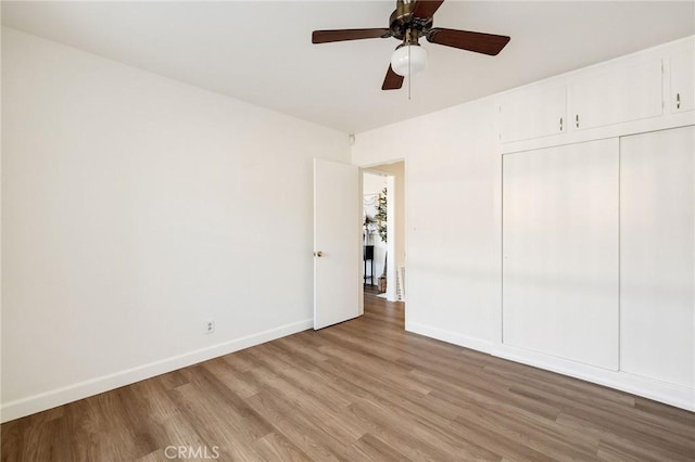 4709 W 149th St, Lawndale, CA 90260 - unfurnished bedroom with light wood finished floors, a closet, and a ceiling fan