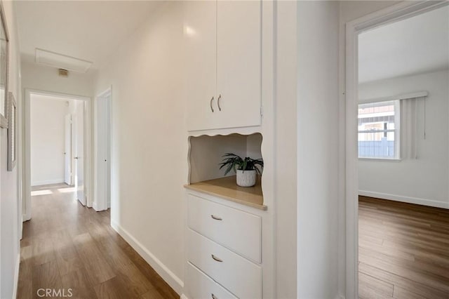 4709 W 149th St, Lawndale, CA 90260 - hallway with dark wood-style floors and attic access