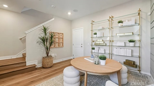 1874 S Union St Unit 28, Anaheim, CA 92805 - dining space featuring stairway, wood finished floors, and recessed lighting