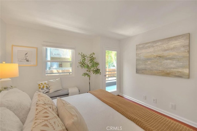 360 S Los Robles Ave Unit 10, Pasadena, CA 91101 - bedroom with baseboards and wood finished floors