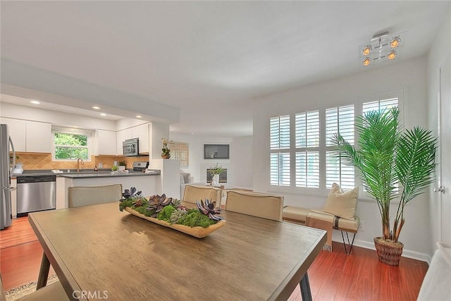 360 S Los Robles Ave Unit 10, Pasadena, CA 91101 - dining room with recessed lighting and light wood-style flooring
