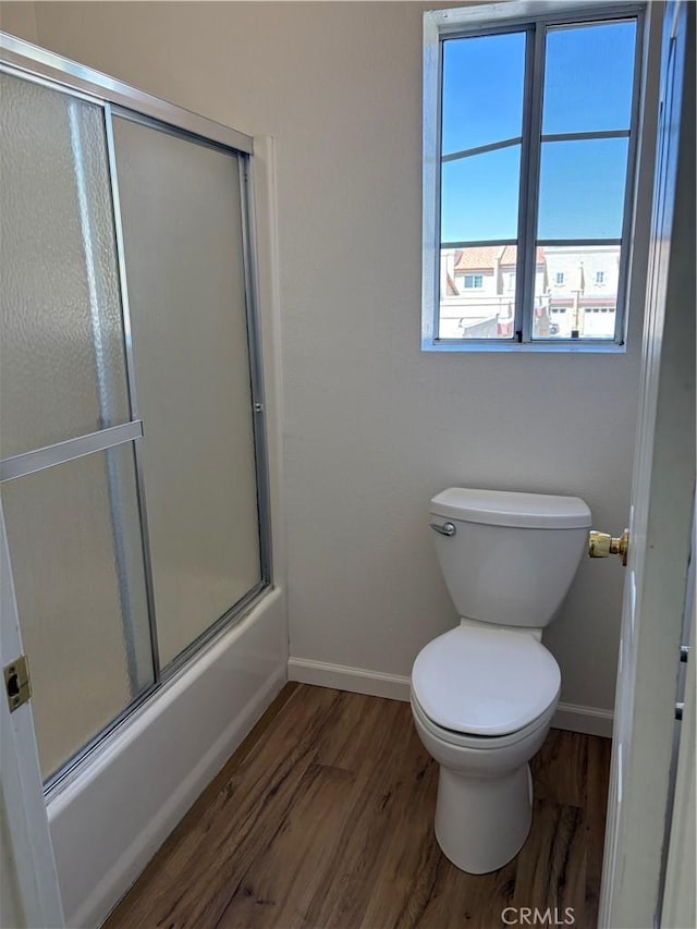 11496 Nautical Ln Unit 19, Helendale, CA 92342 - full bath with wood finished floors and bath / shower combo with glass door