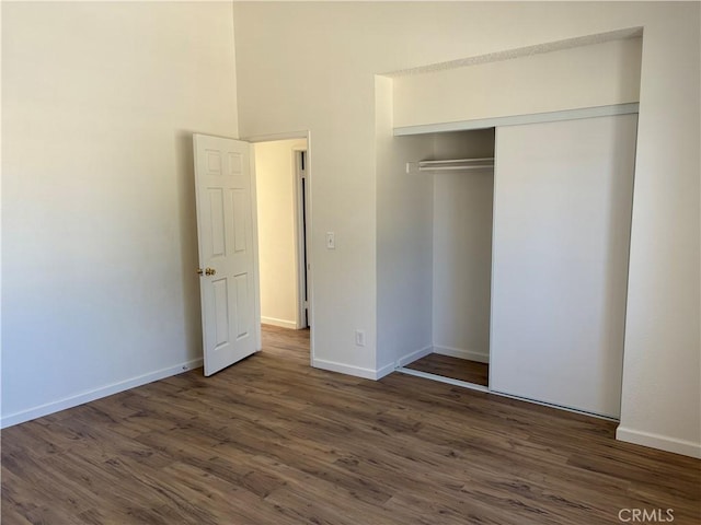 11496 Nautical Ln Unit 19, Helendale, CA 92342 - unfurnished bedroom featuring wood finished floors and a closet