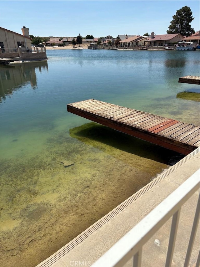 11496 Nautical Ln Unit 19, Helendale, CA 92342 - dock area featuring a water view and a residential view