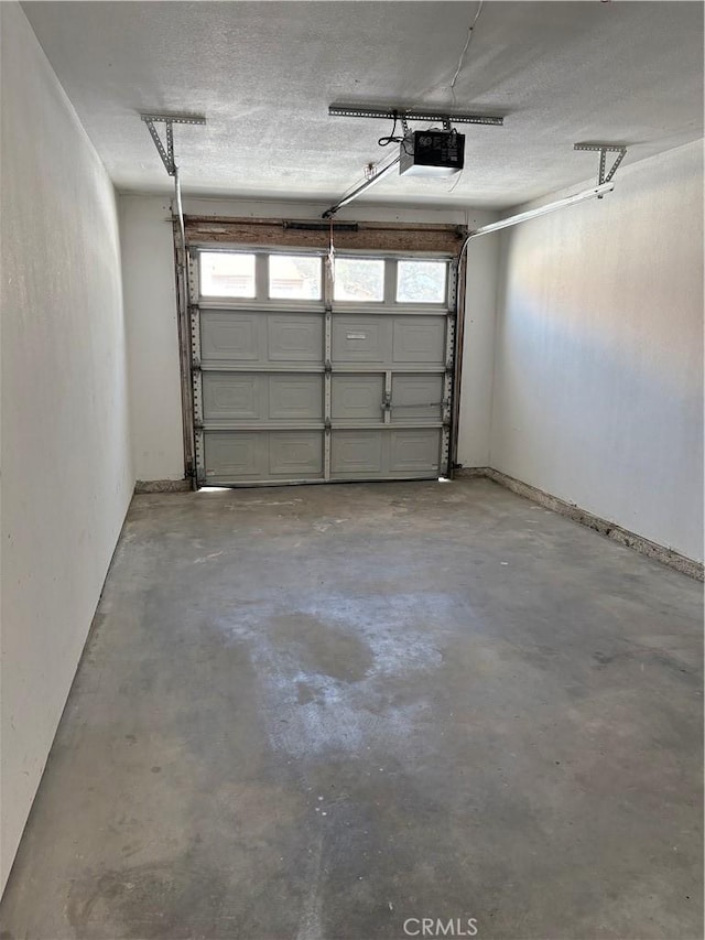 11496 Nautical Ln Unit 19, Helendale, CA 92342 - garage featuring a garage door opener