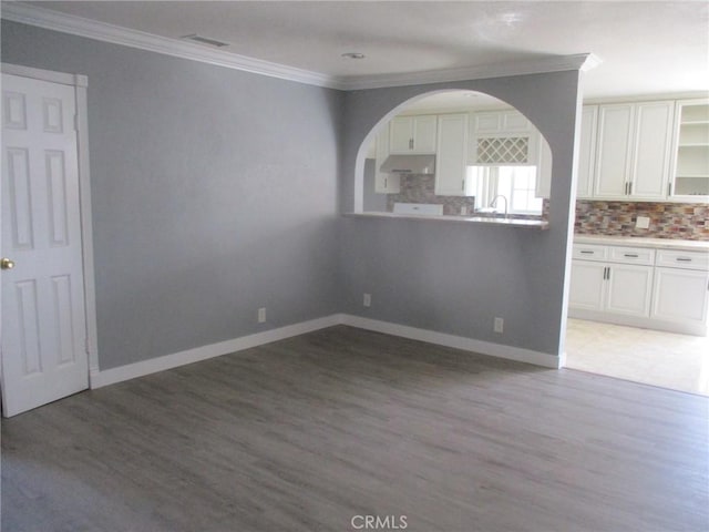 12681 Trask Ave, Garden Grove, CA 92843 - empty room with ornamental molding and light wood-style floors