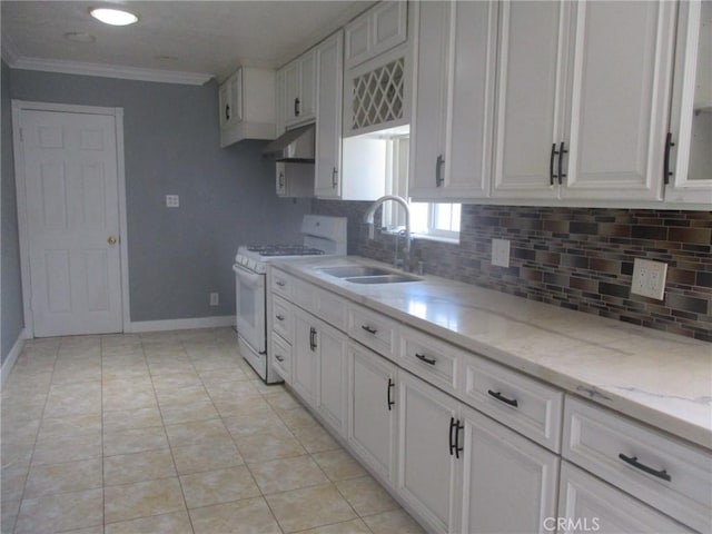 12681 Trask Ave, Garden Grove, CA 92843 - kitchen with white range with gas stovetop, crown molding, decorative backsplash, light stone countertops, and under cabinet range hood