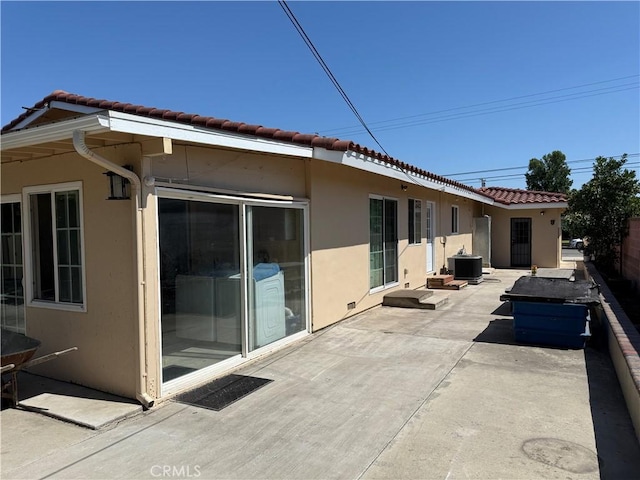12681 Trask Ave, Garden Grove, CA 92843 - rear view of house with stucco siding, a tile roof, and a patio