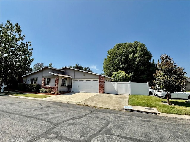 27505 Jasper Way, Castaic, CA 91384 - mid-century modern home with a garage, driveway, and a gate