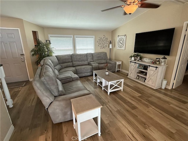 27505 Jasper Way, Castaic, CA 91384 - living area with vaulted ceiling, a ceiling fan, and wood finished floors