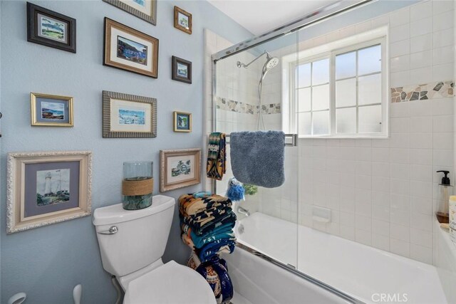 530 Bluerock Dr, San Luis Obispo, CA 93401 - full bathroom featuring toilet and combined bath / shower with glass door
