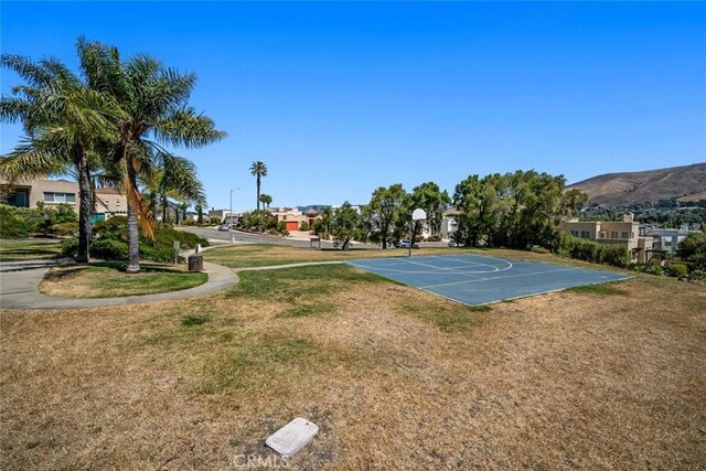 530 Bluerock Dr, San Luis Obispo, CA 93401 - view of basketball court featuring a lawn, community basketball court, a mountain view, and a residential view