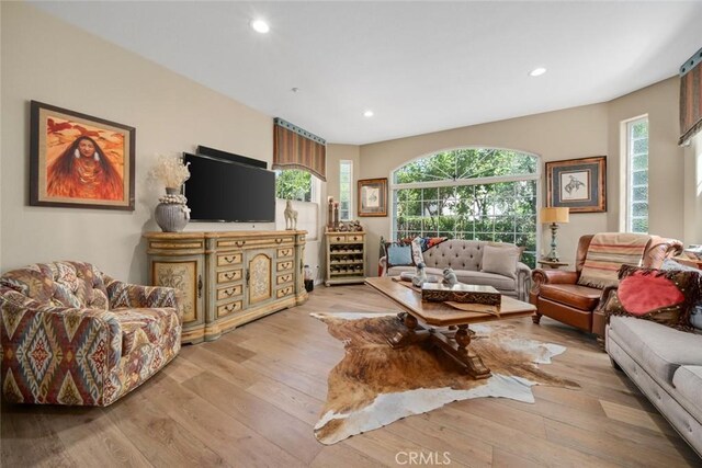 530 Bluerock Dr, San Luis Obispo, CA 93401 - living area with wood finished floors, healthy amount of natural light, and recessed lighting