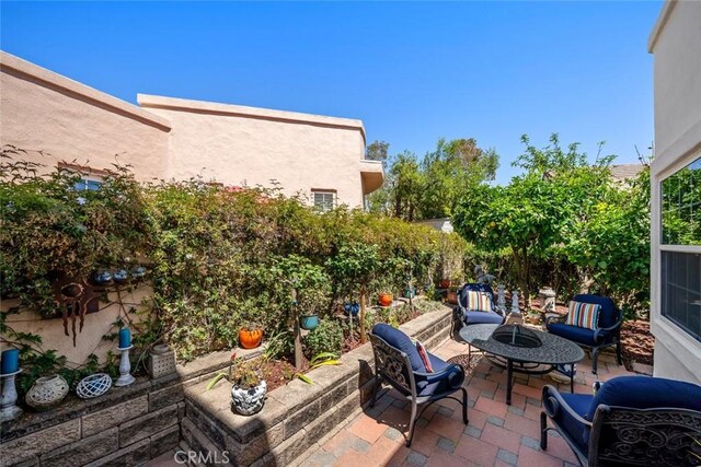 530 Bluerock Dr, San Luis Obispo, CA 93401 - view of patio / terrace with a fire pit