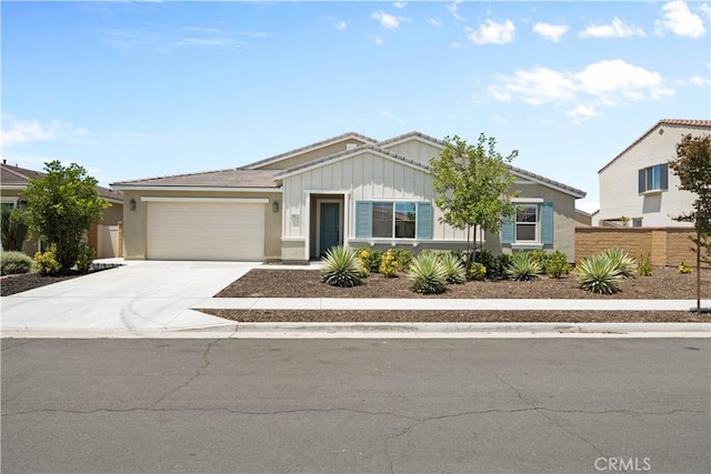 30071 Merrick Ln, Menifee, CA 92584 - single story home with a garage, driveway, board and batten siding, and stucco siding