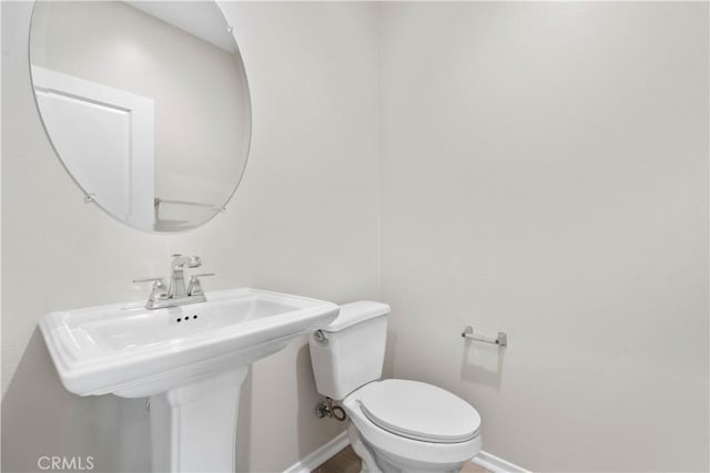 30071 Merrick Ln, Menifee, CA 92584 - bathroom featuring baseboards and toilet