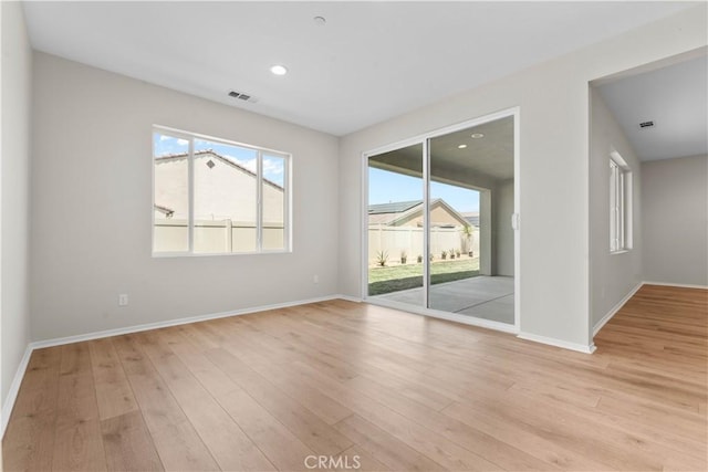 30071 Merrick Ln, Menifee, CA 92584 - empty room featuring light wood-style flooring and recessed lighting