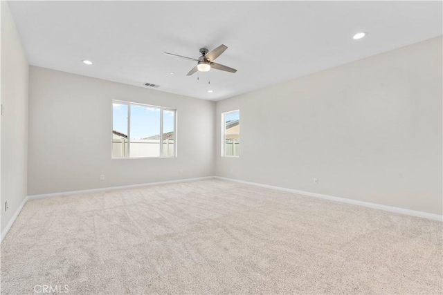 30071 Merrick Ln, Menifee, CA 92584 - spare room with a ceiling fan, light colored carpet, and recessed lighting
